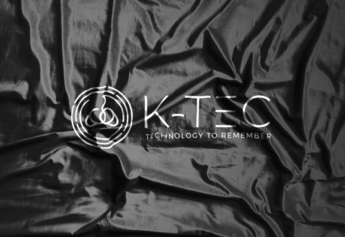 K-TEC logo embossed on silk fabric