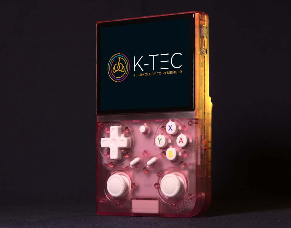 BATLEXP G350 in Transparent Pink shown at an angle, displaying the front controls alongside the side-mounted microSD card slot, power button, and reset button